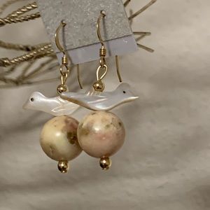 Gold beaded opal bird earrings.